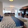 Top Floor King Suite w/ Balcony Partial Ocean View - A505