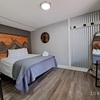 Signature Suite 1 King + Separate Queen Bedroom + Kitchenette