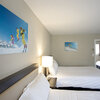 Deluxe 3 Queen Bed Suite w/ Kitchenette Standard